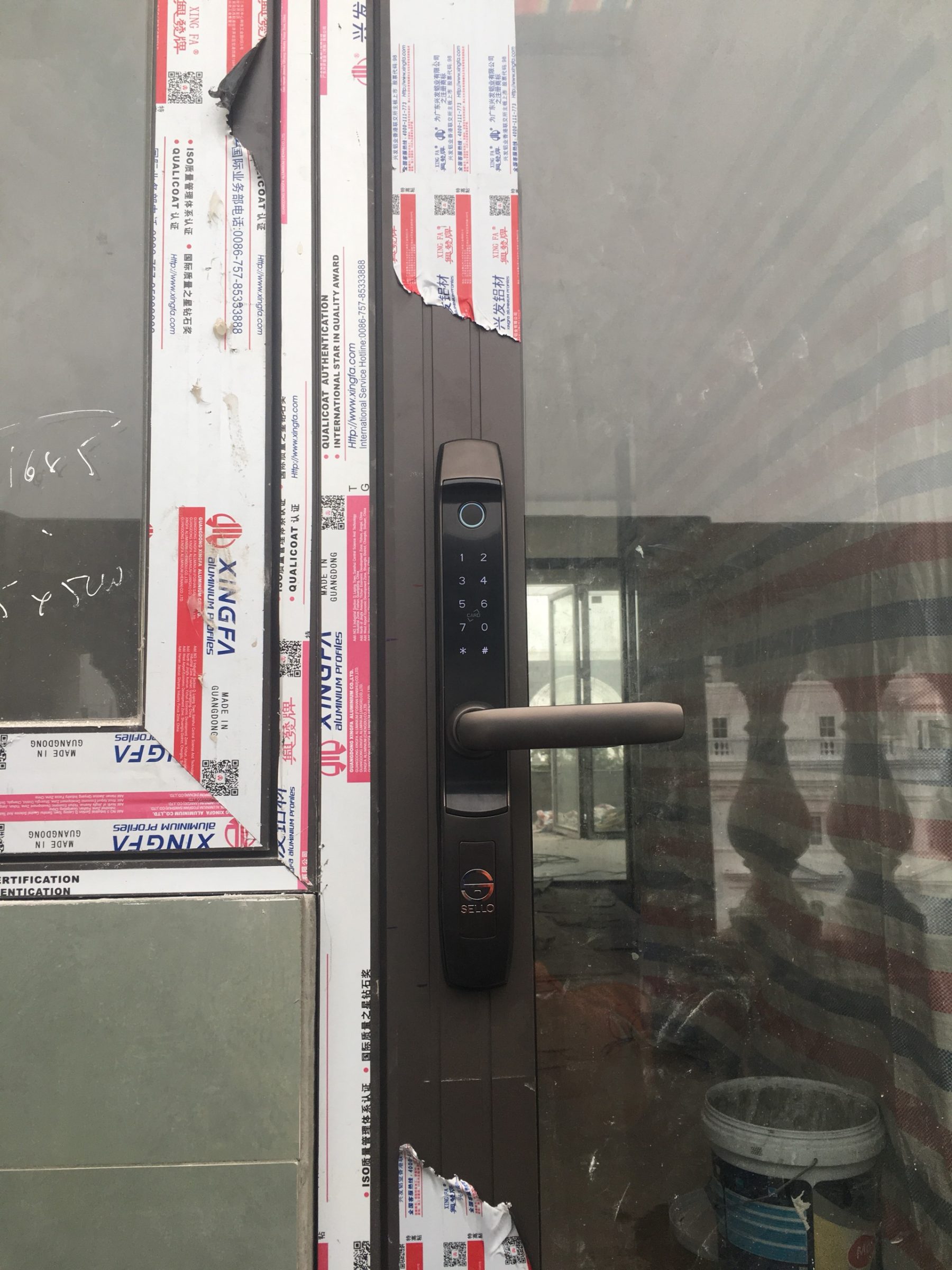 Lắp đặt khoá SELLO A1 cho cửa nhôm kính tại Đại Mỗ